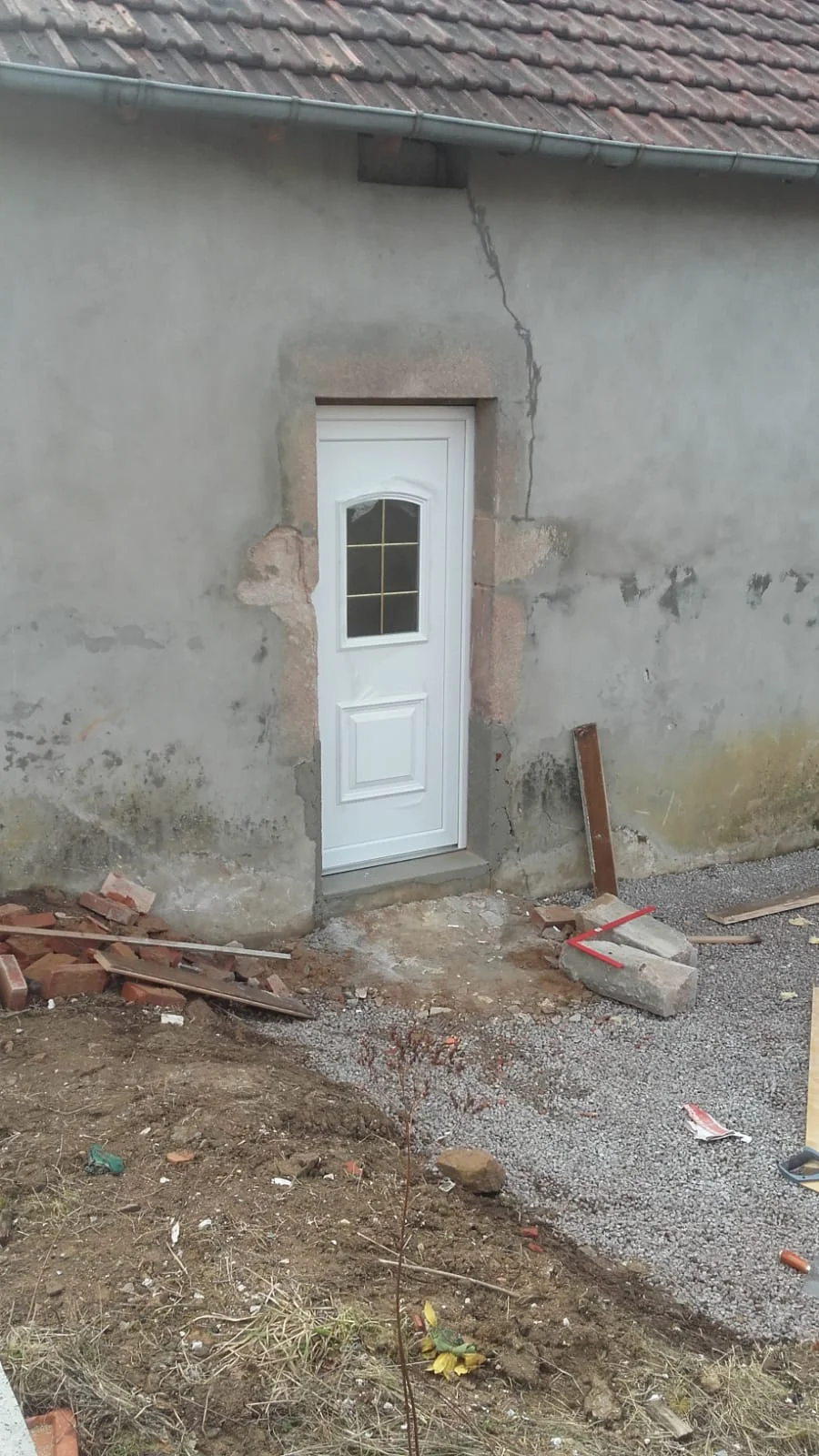Fenêtres remplacées par une porte, chantier terminé